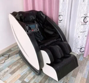A XUTI Electric Massage Chair in a home setting, showcasing its comfortable design and advanced massage features in use.